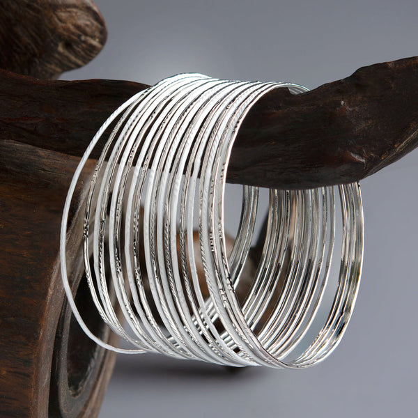 White And Silver Toned Set of Bangles