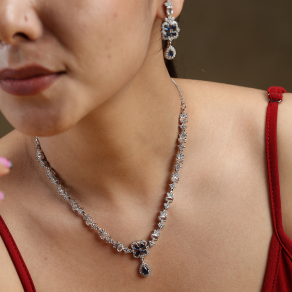 Iksava Silver Plated Blue Sapphire and American Diamonds Studded Necklace Set with Earrings for Women