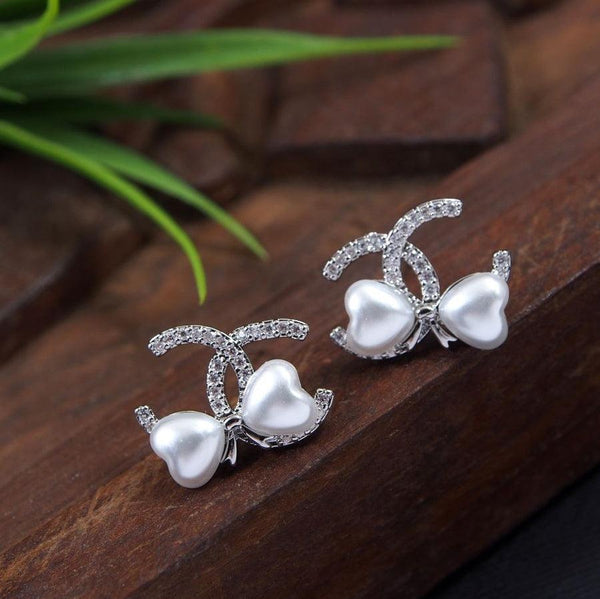 Korean Gold/ Silver/Rosegold Plated Bow Knot Design Fancy Stud Earring- KRNER 3643 - Trendisia