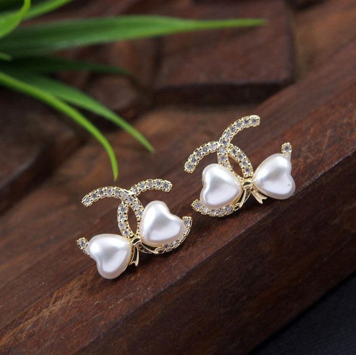 Korean Gold/ Silver/Rosegold Plated Bow Knot Design Fancy Stud Earring- KRNER 3643 - Trendisia