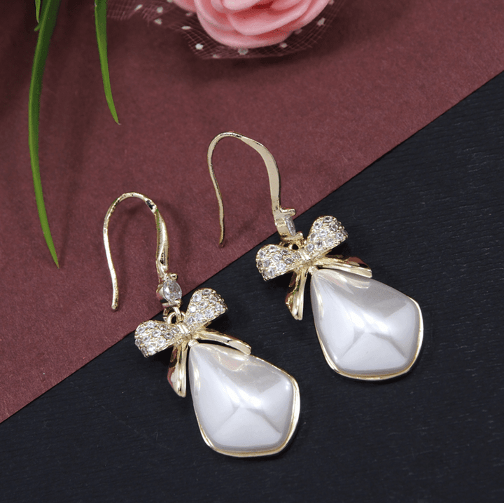 Korean Gold/Silver/Rosegold Plated Geometrical Shaped BowKnot Drop Earring- KRNER 3662 - Trendisia