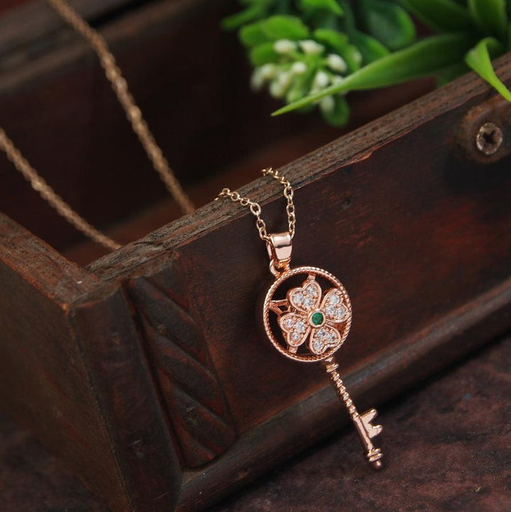 Stainless Steel Gold/Rosegold Plated Spinning Floral Key Shaped Pendent Necklace - SSNK 4316 - Trendisia