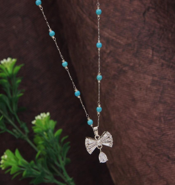 Stainless Steel Silver Bow Shaped Pendent Pearl Chain Necklace - STNK 4956 - Trendisia