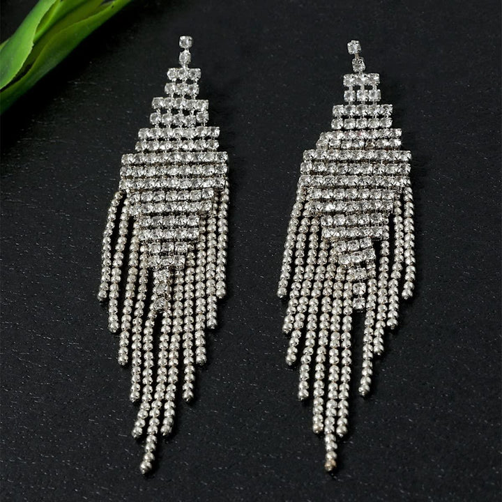 Silver-Toned Feather Shaped Drop Earrings - Trendisia
