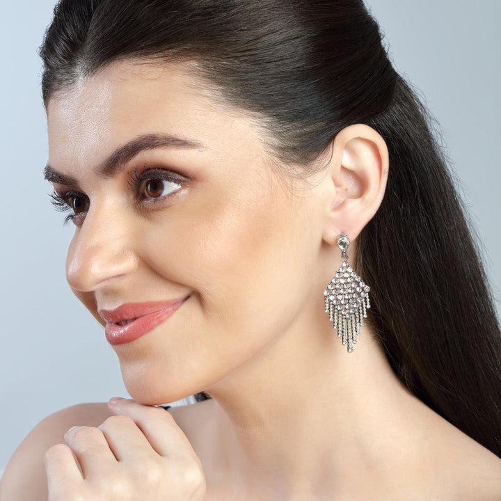 Silver-Toned Feather Shaped Drop Earrings - Trendisia